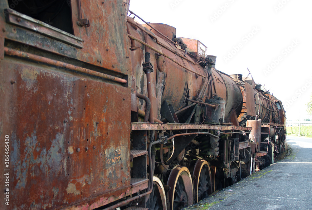 Old rusty steam locomotive. Vintage railroad