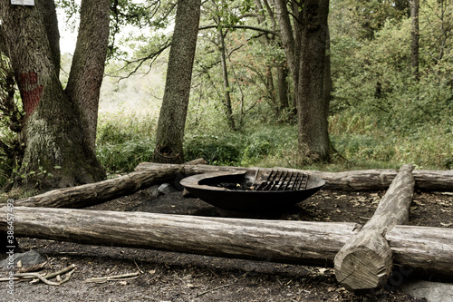 Canvas Print Benches and campfire on the hiking trail