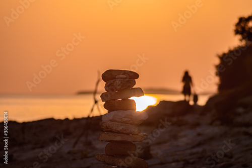 Fototapeta Naklejka Na Ścianę i Meble -  Sunset at Cisterna beach in Rovinj Croatia