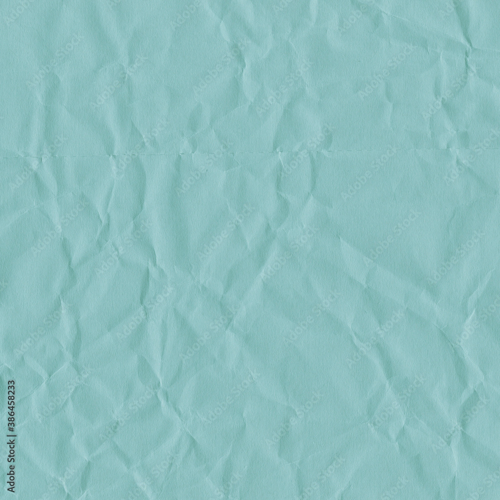 Obraz premium Blue vintage and old looking crumpled paper background. Retro cardboard texture. Grunge paper for drawing. Ancient book page. Present wrapping.
