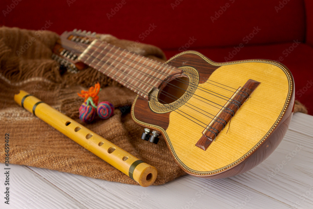 Andean string and wind musical instruments. Charango and quena. Stock ...