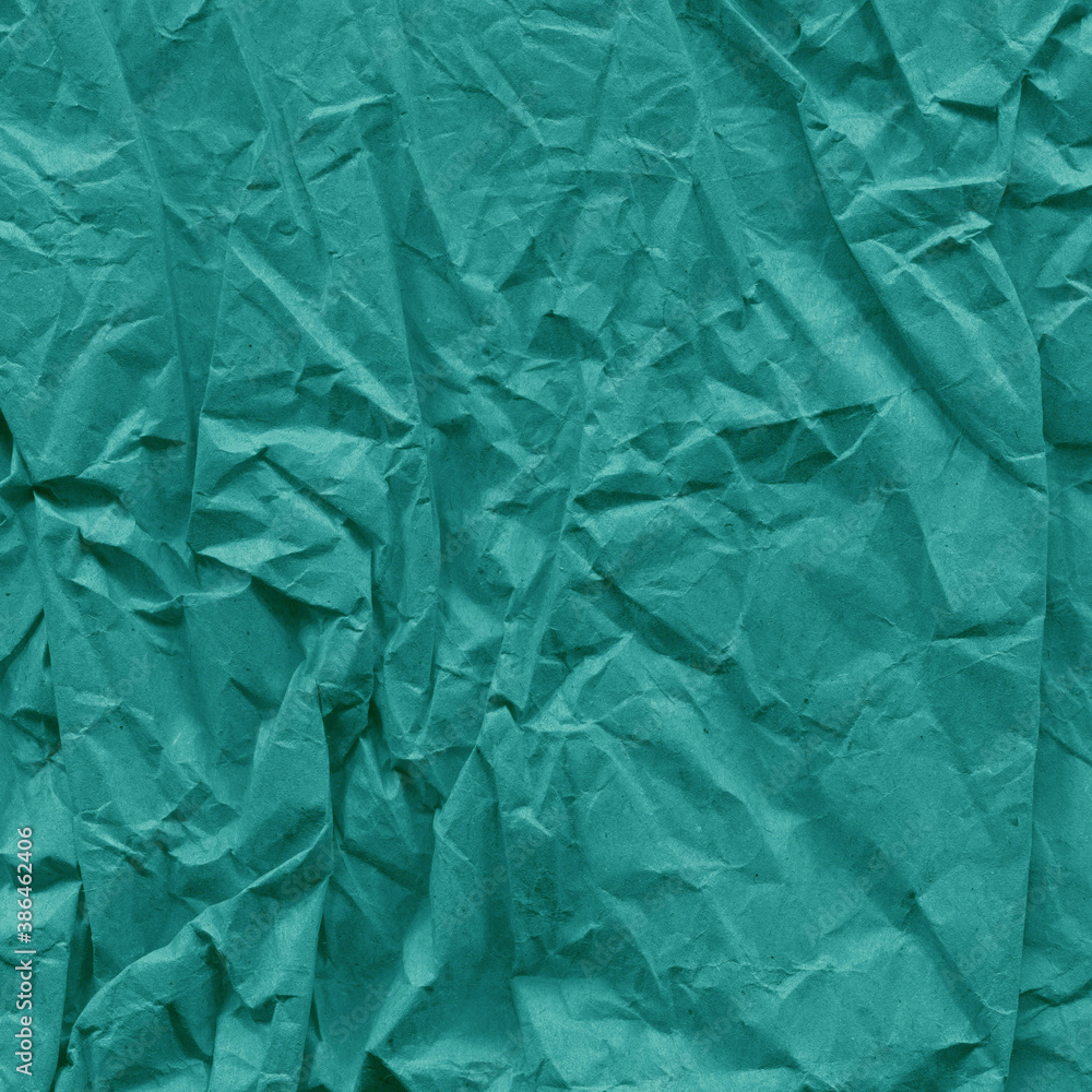 Obraz premium Blue vintage and old looking crumpled paper background. Retro cardboard texture. Grunge paper for drawing. Ancient book page. Present wrapping.