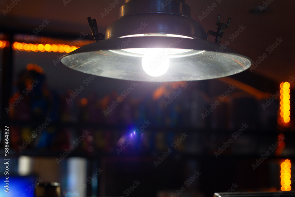 Fototapeta premium Lamp above the bar. Suitable as either texture or background