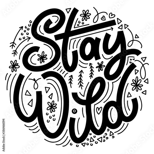 Stay wild lettering in doodle style. Inspirational and motivational quote. Design for print, poster, card, invitation, t-shirt, badges and sticker photo