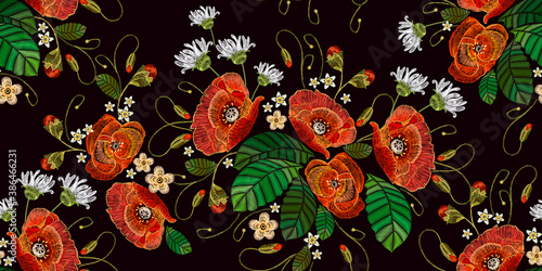 Embroidery red poppies and white flowers on black background. Template fashionable clothes, t-shirt design. Seamless pattern