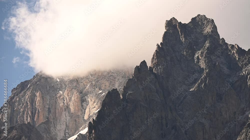 Granite Peaks of the Mont Blanc Massif in Northern Italy Covered by Clouds Granite Peaks of the Mont Blanc Massif in Northern Italy Covered by Clouds