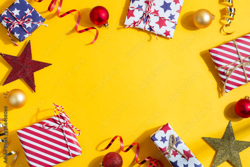 Fototapeta premium Holiday frame from Christmas gift boxes and decoration.