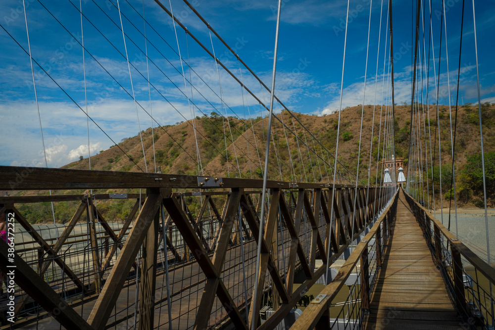 Obraz premium Santa Fe de Antioquia / Colombia - January 21, 2018. Puente de Occidente (Western Bridge) in Santa Fe de Antioquia, Colombia
