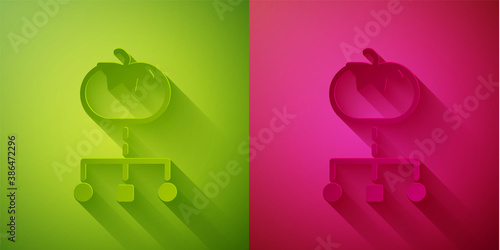Paper cut Genetically modified food icon isolated on green and pink background. GMO fruit. Paper art style. Vector.