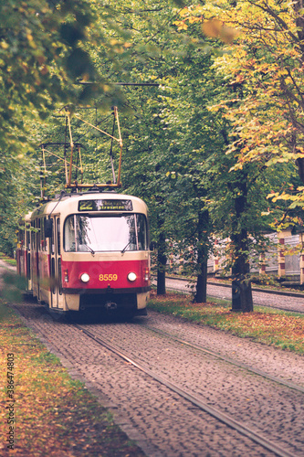 old red tram in autumn Prague
