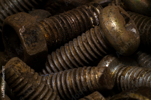 Abandoned dirty dusty old rusty screws
