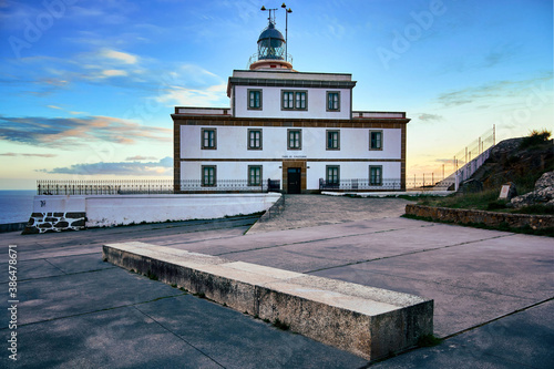 Finisterre Cape Lighthouse, Costa da Morte, Galicia, Spain. One of the most famous Lighthouse in Western Europe. Last stage in the Camino de Santiago. photo