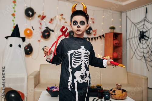 Wallpaper Mural Portrait of little boy dressed as devil for Halloween house part Torontodigital.ca