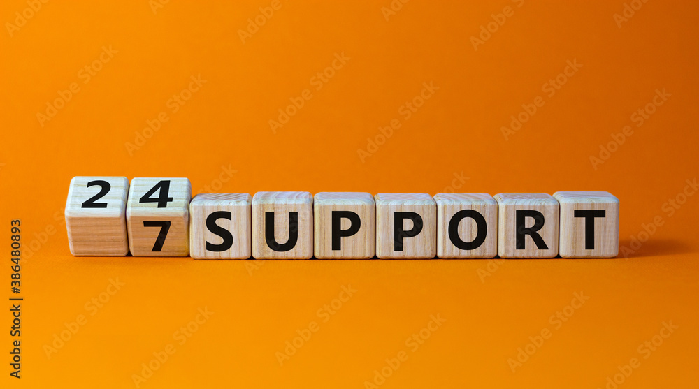 Cubes form the expression '24/7 support'. Beautiful orange background. Business concept. Copy space. Cubes form the expression '24/7 support'. Beautiful orange background. Business concept. Copy space.