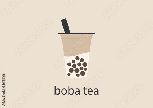 A plastic cup of boba tea with tapioca pearls and milk, a trendy asian drink