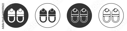 Black Slippers icon isolated on white background. Flip flops sign. Circle button. Vector.