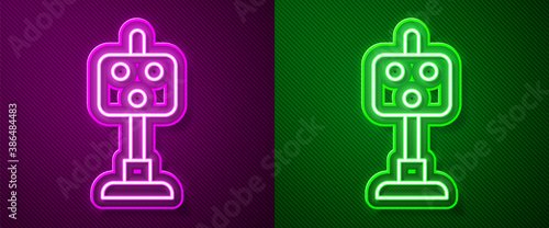 Glowing neon line Train traffic light icon isolated on purple and green background. Traffic lights for the railway to regulate the movement of trains. Vector.