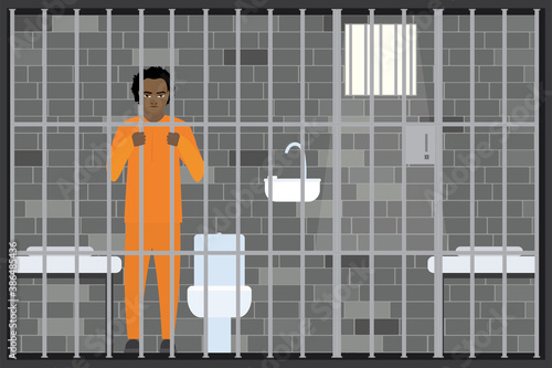 Jailed man in prison cell. Suspect, convict in Interrogation Room. African american lawbreaker or offender in prison uniform.
