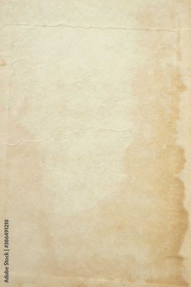 yellowed blank sheet of old paper close, soft focus yellowed blank sheet of old paper close, soft focus