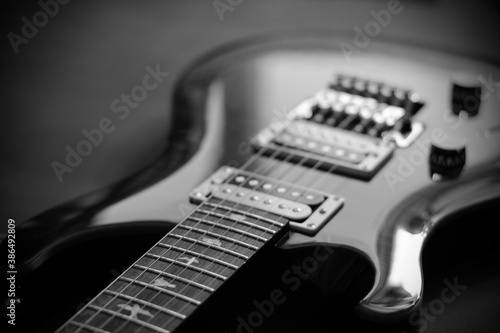 Electric guitar on a dark background.