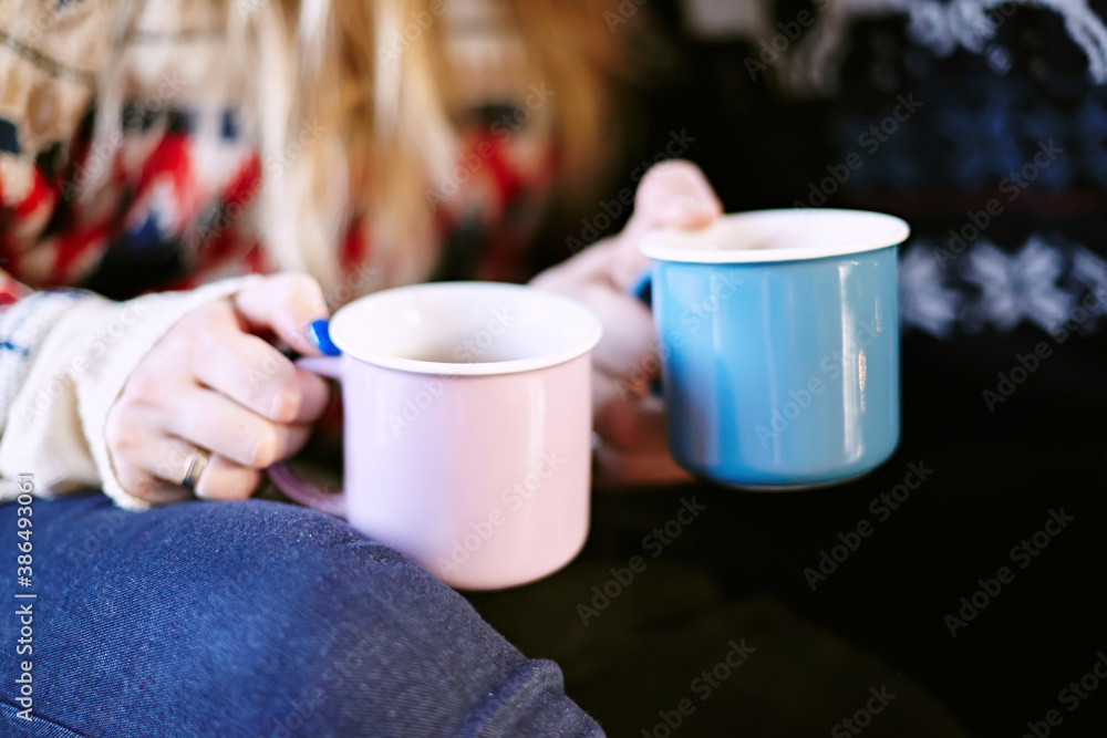 Couple in love holding cup of coffee. Two cups of coffee. Christmas time. Couple in love holding cup of coffee. Two cups of coffee. Christmas time.