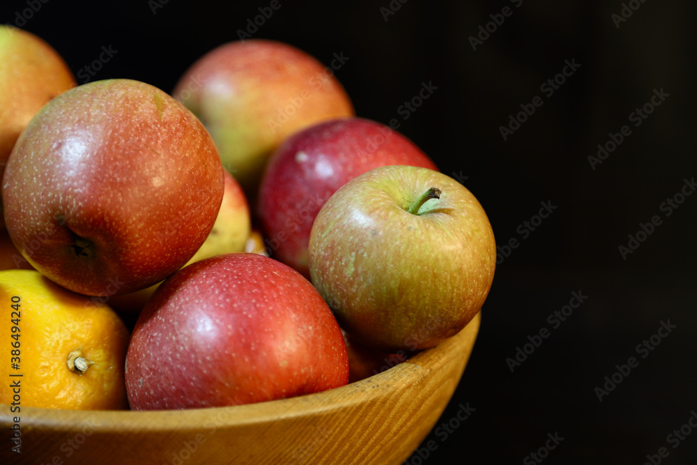 half of a bowl of apples half of a bowl of apples