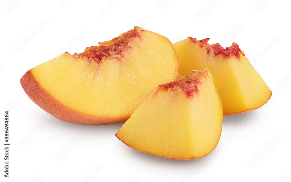 Ripe peach fruit slices isolated on white background with clipping path and full depth of field Ripe peach fruit slices isolated on white background with clipping path and full depth of field