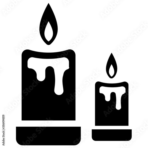 
Glyph of two burning wax candles commemorating the concept of aromatic candles 
