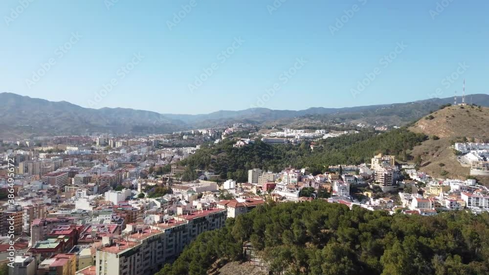 View from the mountains of Spain, Malaga. You can see the center of Malaga, the port, yachts and how birds fly in the sky. View from the mountains of Spain, Malaga. You can see the center of Malaga, the port, yachts and how birds fly in the sky.