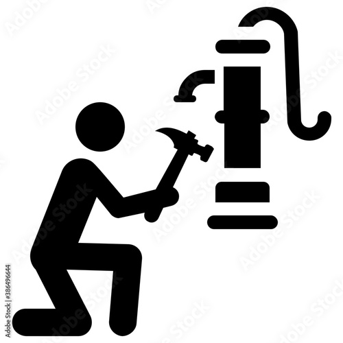 
Human avatar of plumber holding hammer and sitting near to hand pump
