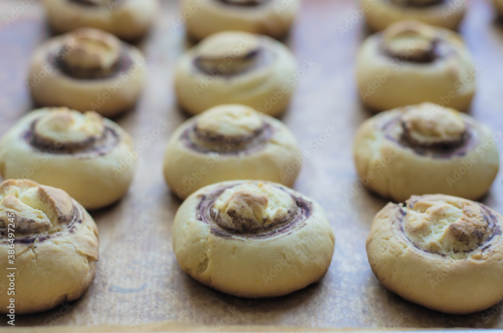 Homemade mushroom-shaped cookies on parchment paper. Shortbread. Homemade mushroom-shaped cookies on parchment paper. Shortbread.