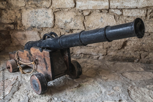 medieval cannon in an old abandoned castle