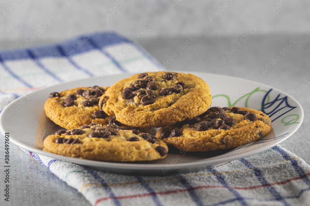 Homemade cookies with chocolate on white plane