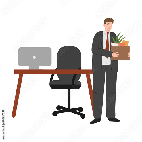 Sad frustrated fired man office worker holding box of belongings from desk