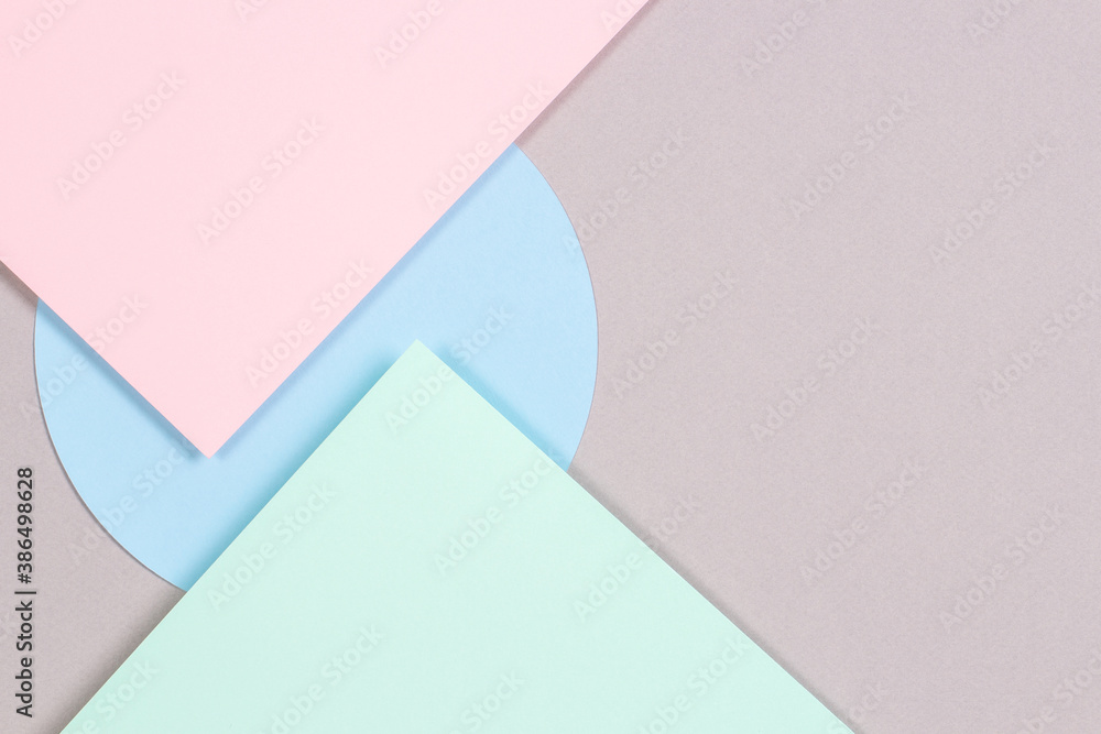 Abstract geometric texture background of fashion soft green, pastel pink, light blue, gray color paper. Top view, flat lay Abstract geometric texture background of fashion soft green, pastel pink, light blue, gray color paper. Top view, flat lay