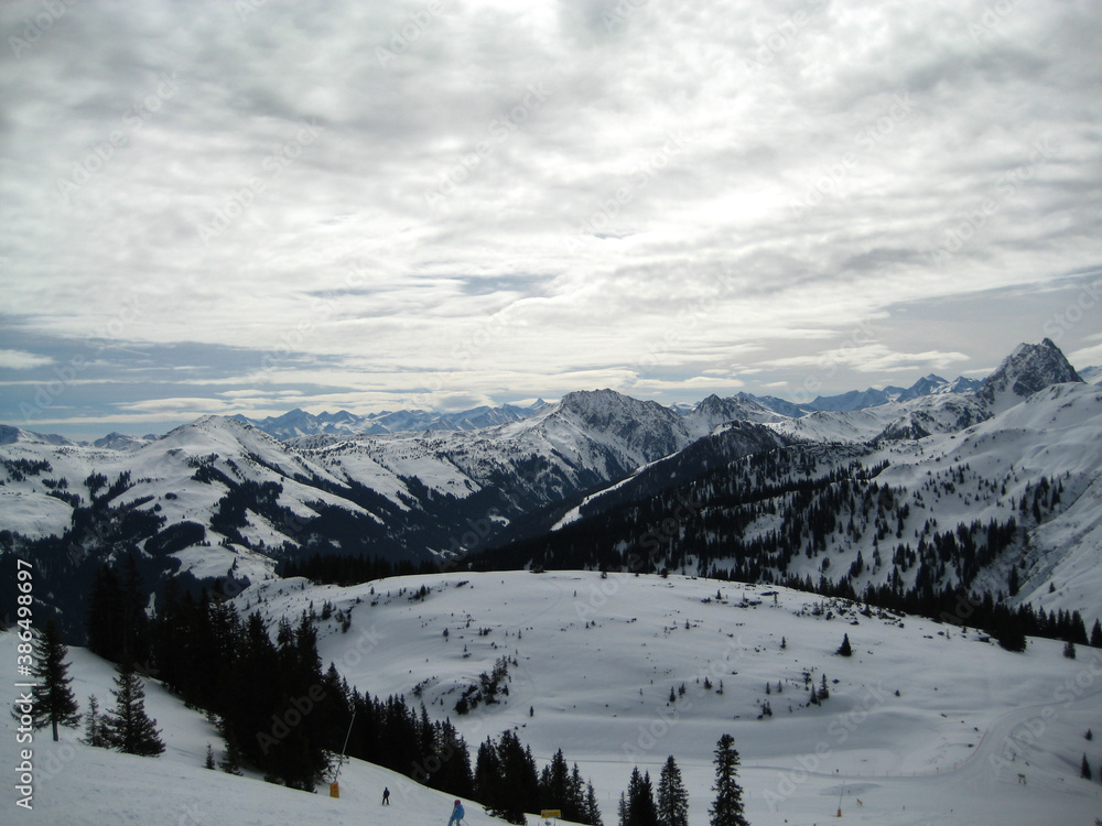 winter wonderland under sunny cloudy sky