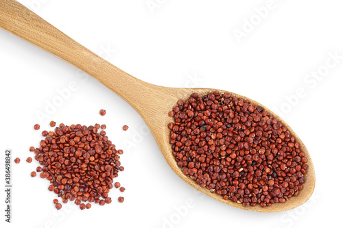 red quinoa seeds in wooden spoon isolated on white background with clipping path and full depth of field. Top view. Flat lay