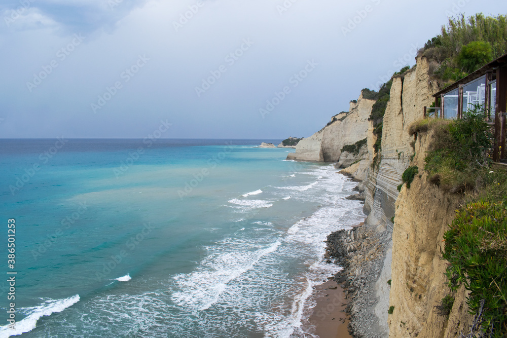 Limestone cliffs on the northwestern shore of Corfu Island, Greece, as seen from Logas the Sunset beach viewpoint