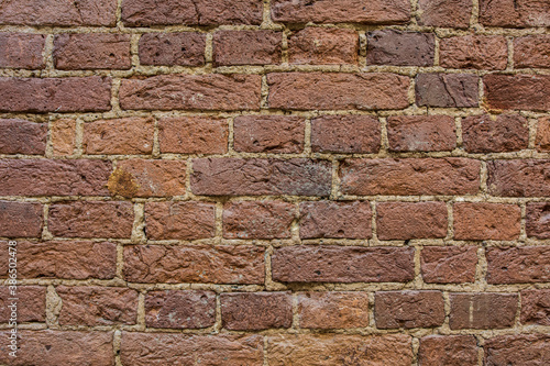 The texture of the old masonry of red brick.