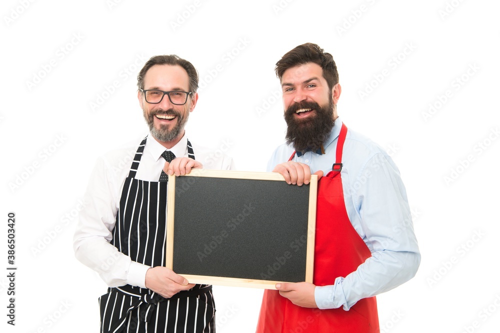blackboard. cafe and restaurant opening. bearded men with blackboard, copy space. menu planning. happy chef team in apron. catering business. welcome on blackboard board. partners celebrate start up blackboard. cafe and restaurant opening. bearded men with blackboard, copy space. menu planning. happy chef team in apron. catering business. welcome on blackboard board. partners celebrate start up