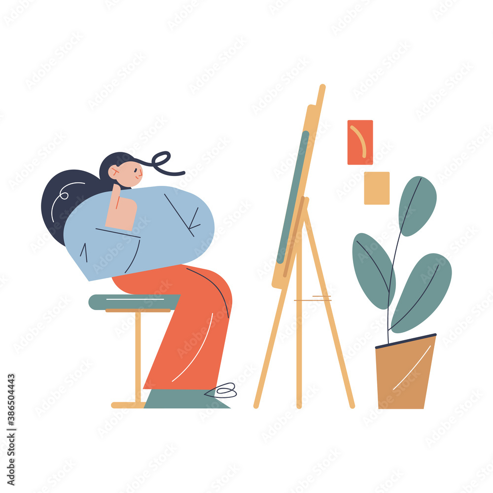 Fototapeta premium Woman sitting opposite easel with artwork and thinking about details in art studio