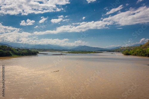 The Cauca River is the second most important river in Colombia. It is born near the Ox lagoon in the Colombian Massif  department of Cauca .