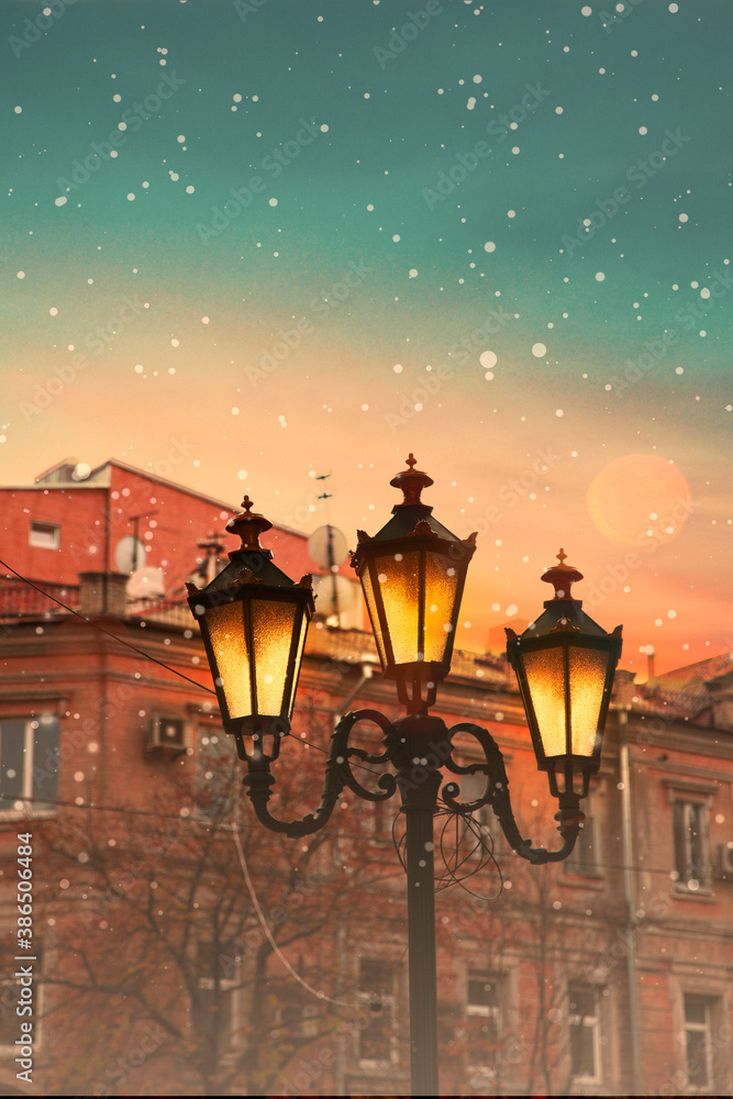 lantern on the street. Yellow lantern. Yellow light.  Evening city
