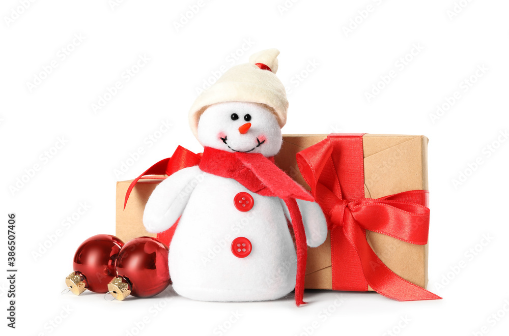 Cute snowman toy, gift boxes and red Christmas balls isolated on white