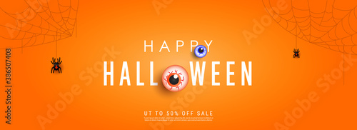 Happy halloween sale horizontal banner background template. Cobweb, spiders and scary eyeballs on orange background with copy space