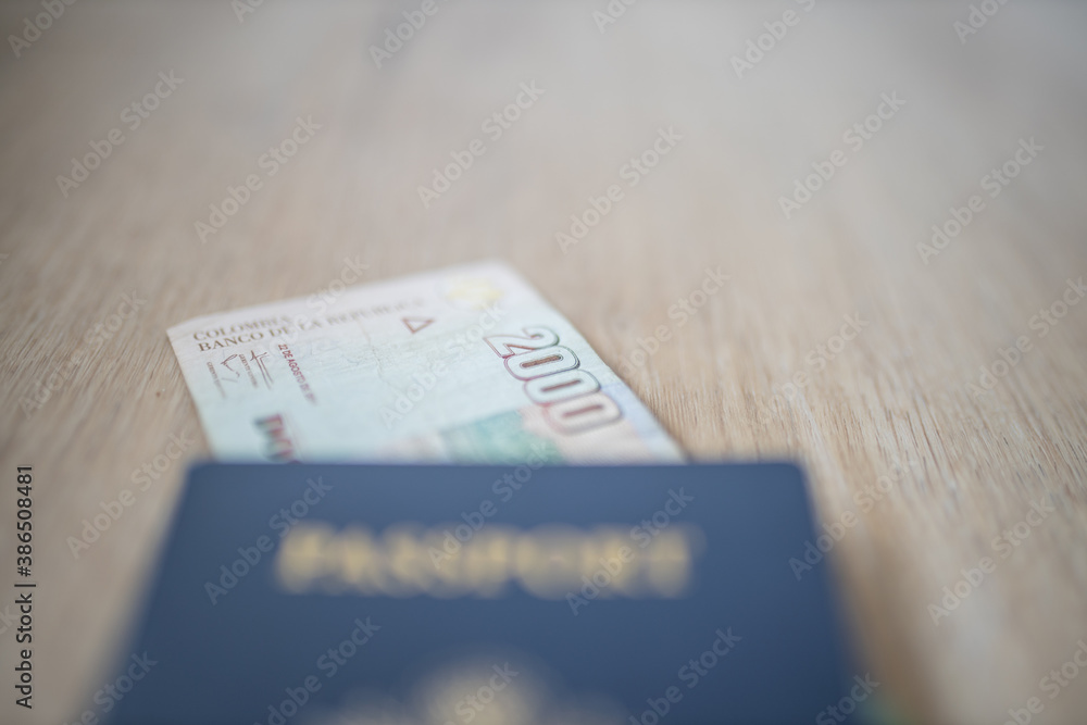 A 2000 Colombian Pesos Bill Inside a United States of America Passport A 2000 Colombian Pesos Bill Inside a United States of America Passport