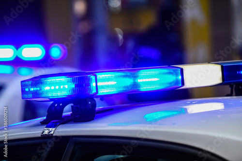 Blue light on a police car © fotosr52
