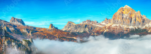 Autumn sunny landscape with View of Tofana di Rozes and Cinque Torri