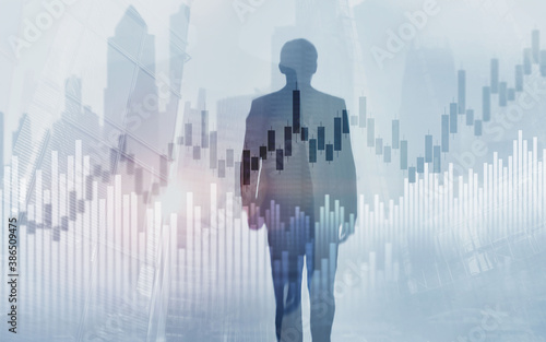 Stock market trading concept with silhouettes background.