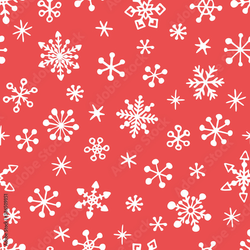 Vector seamless pattern of snowing, hand drawn snowflakes. Simple design for Christmas wrappings, textile and backgrounds